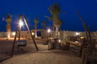 Overnight Desert Camp Experience: Dinner, Emirati Activities and Vintage Land Rover Transport from Dubai