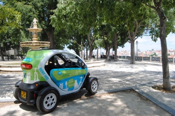 Downtown Lisbon in an Electric Car with GPS Audio Guide