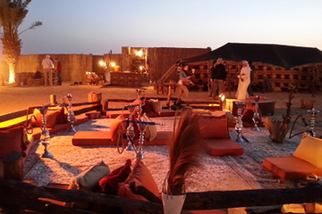 Luxury Desert Experience: Dinner and Emirati Activities with Vintage Land Rover Transport from Dubai