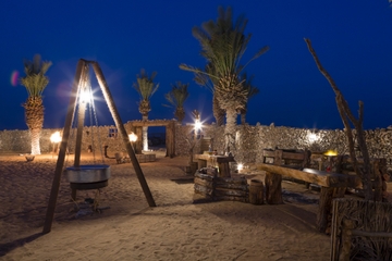 Overnight Desert Camp Experience: Dinner, Emirati Activities and Vintage Land Rover Transport from Dubai