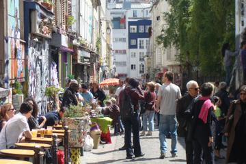 Paris Walking Tour: Visit Belleville and Menilmontant with Champagne Included